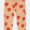 Mini Rodini HEARTS TROUSERS - Tracksuit Bottoms - Beige -Mini Rodini shop 112743e26b8e44d396b9fecb61a47ab0