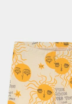 Mini Rodini MOON AND SUN FLARED TROUSERS - Trousers - Yellow -Mini Rodini shop f4fcbaa277444bc1895fa4aab36c65ad